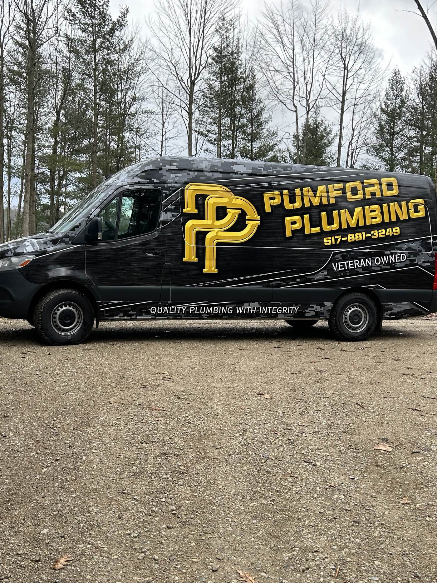 Pumford Plumbing service van with veteran-owned decal, parked in Haslett, Michigan